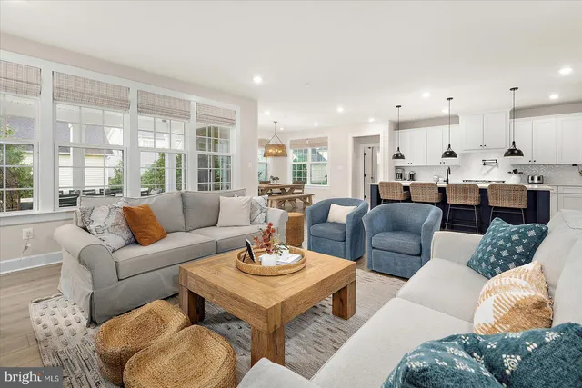 a outdoor space with patio the couches and a dining table with the view of the balcony