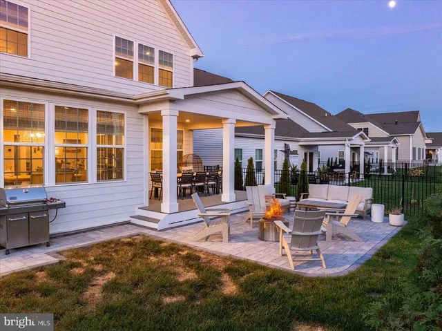 a room with furniture and a book shelf