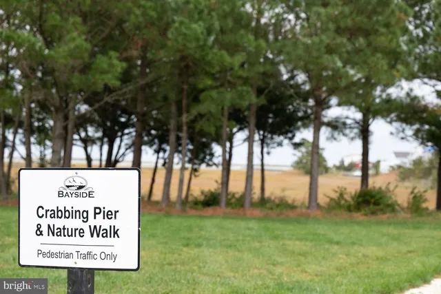 a sign on the side of the road