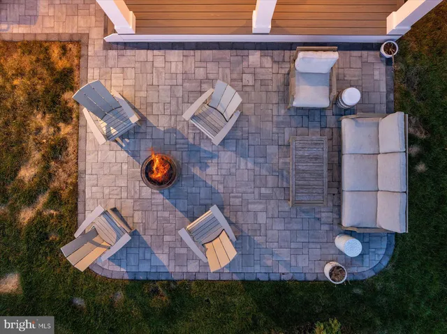 a bathroom with a toilet a sink and a mirror