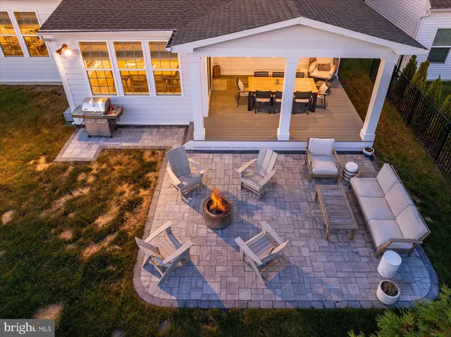 a view of a living room with a fireplace and painted walls