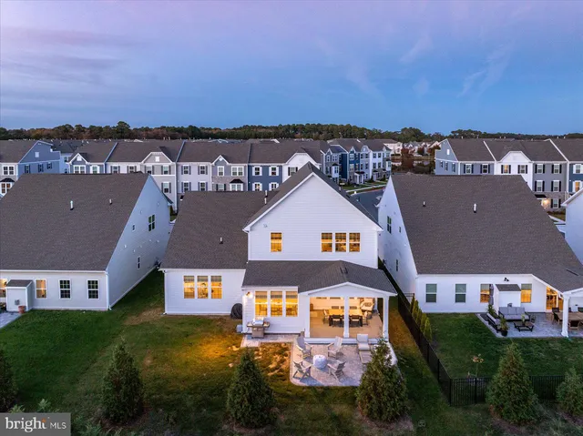 a bathroom with a toilet a sink and a mirror