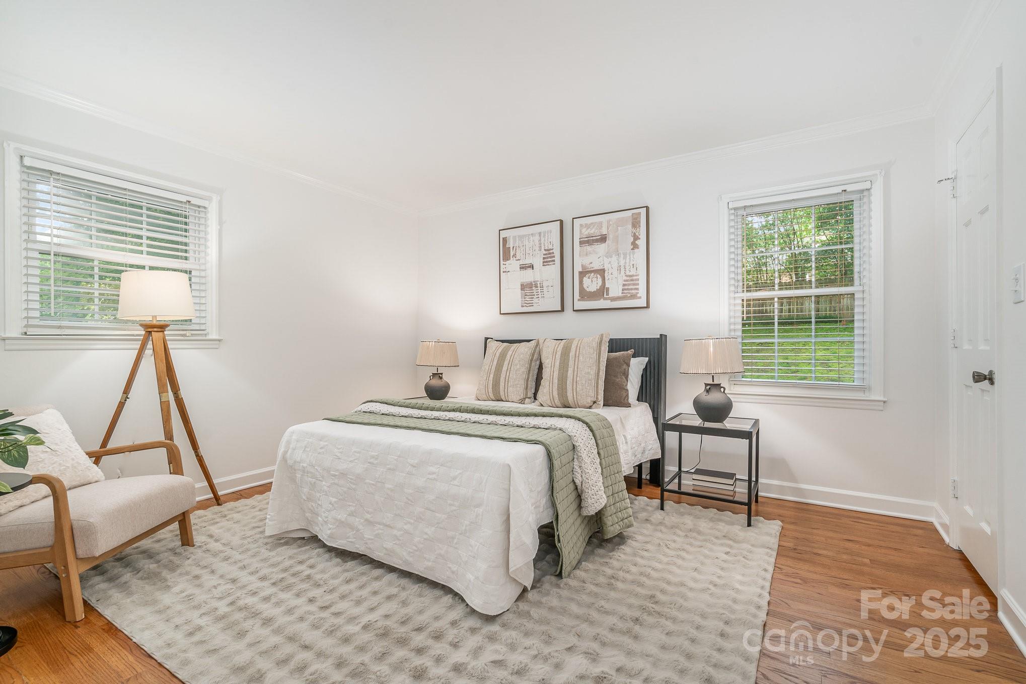 6749 Windyrush Road Charlotte, NC 28226 - Photo 19 of 30 a bed room with a bed and a window