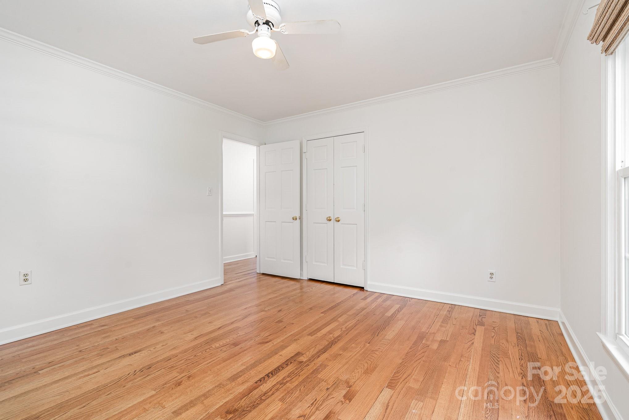 6749 Windyrush Road Charlotte, NC 28226 - Photo 23 of 30 wooden floor in an empty room