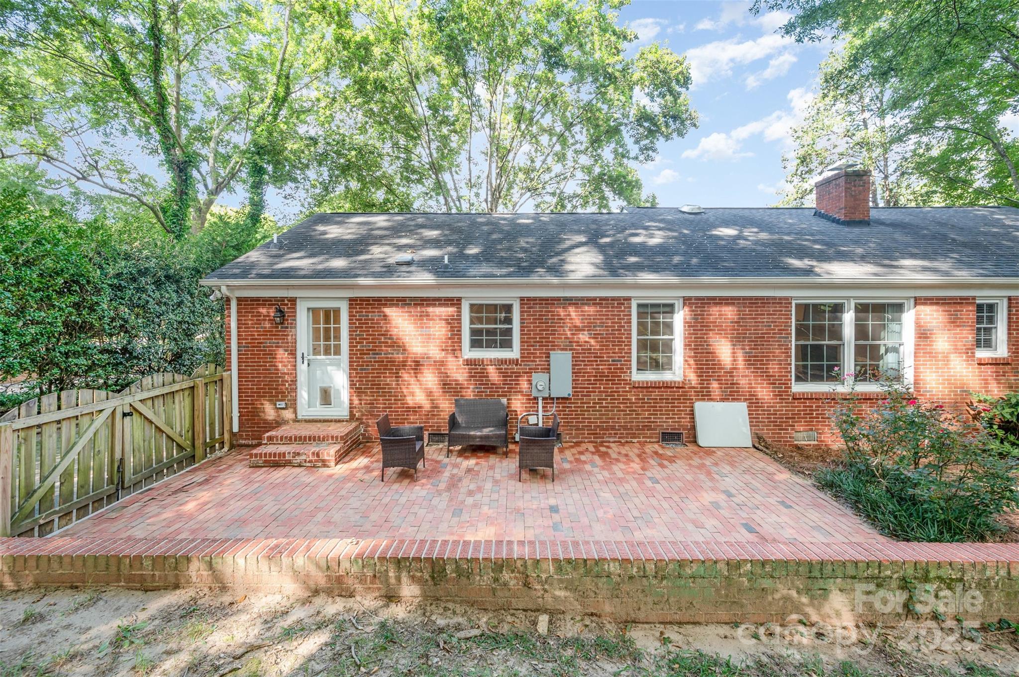 6749 Windyrush Road Charlotte, NC 28226 - Photo 24 of 30 a view of house with outdoor seating