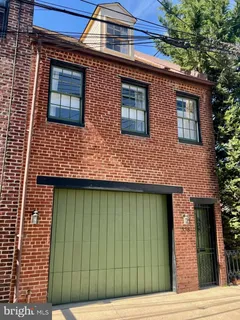 a view of a brick house with a door