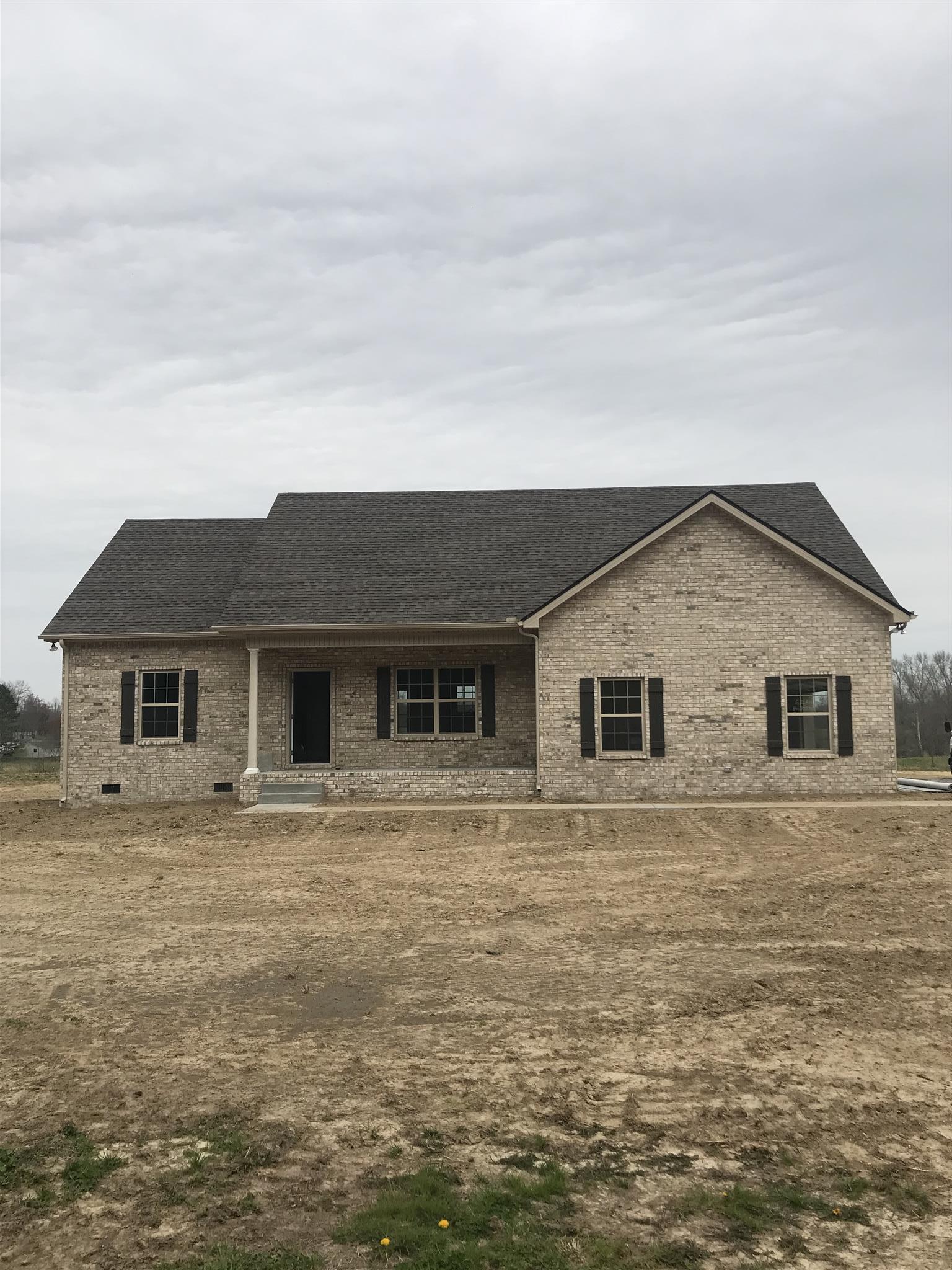 649 Elrod Road Manchester, TN 37355 - Photo 1 of 2 a house that has a window in front of it