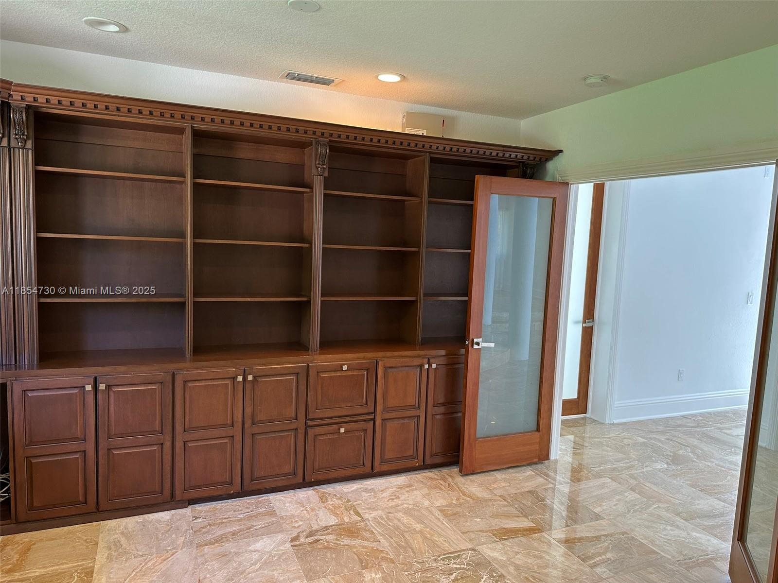 10600 Southwest 69th Avenue Pinecrest, FL 33156 - Photo 12 of 55 a view of a walk in closet