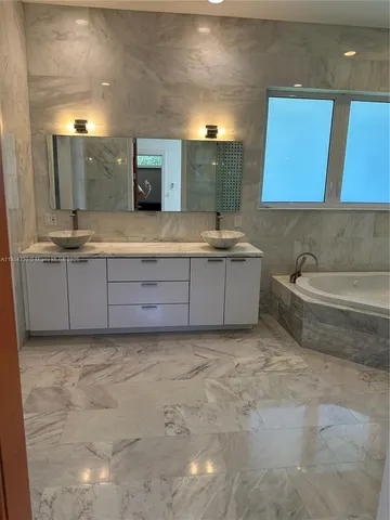 a bathroom with a bathtub