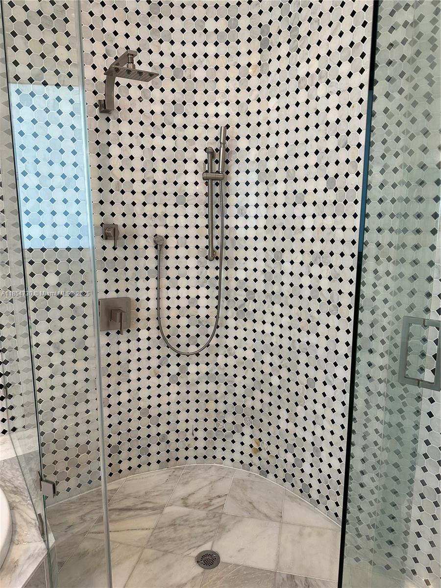 10600 Southwest 69th Avenue Pinecrest, FL 33156 - Photo 20 of 55 a bathroom with a sink a toilet and a shower