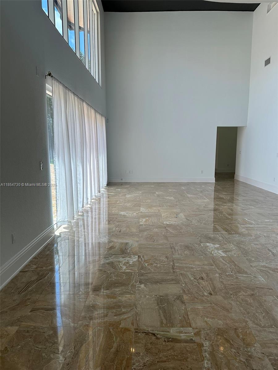 10600 Southwest 69th Avenue Pinecrest, FL 33156 - Photo 9 of 55 a view of an empty room