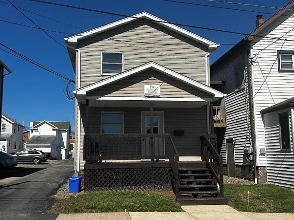 a front view of a house with street