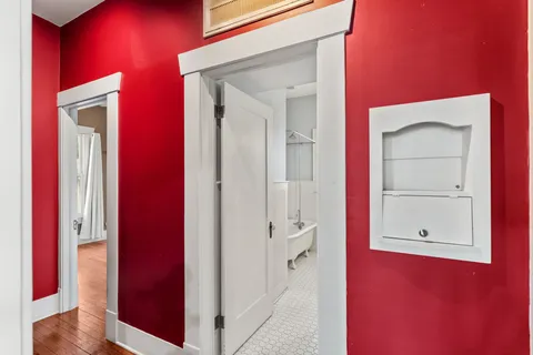 a view of a hallway with closet