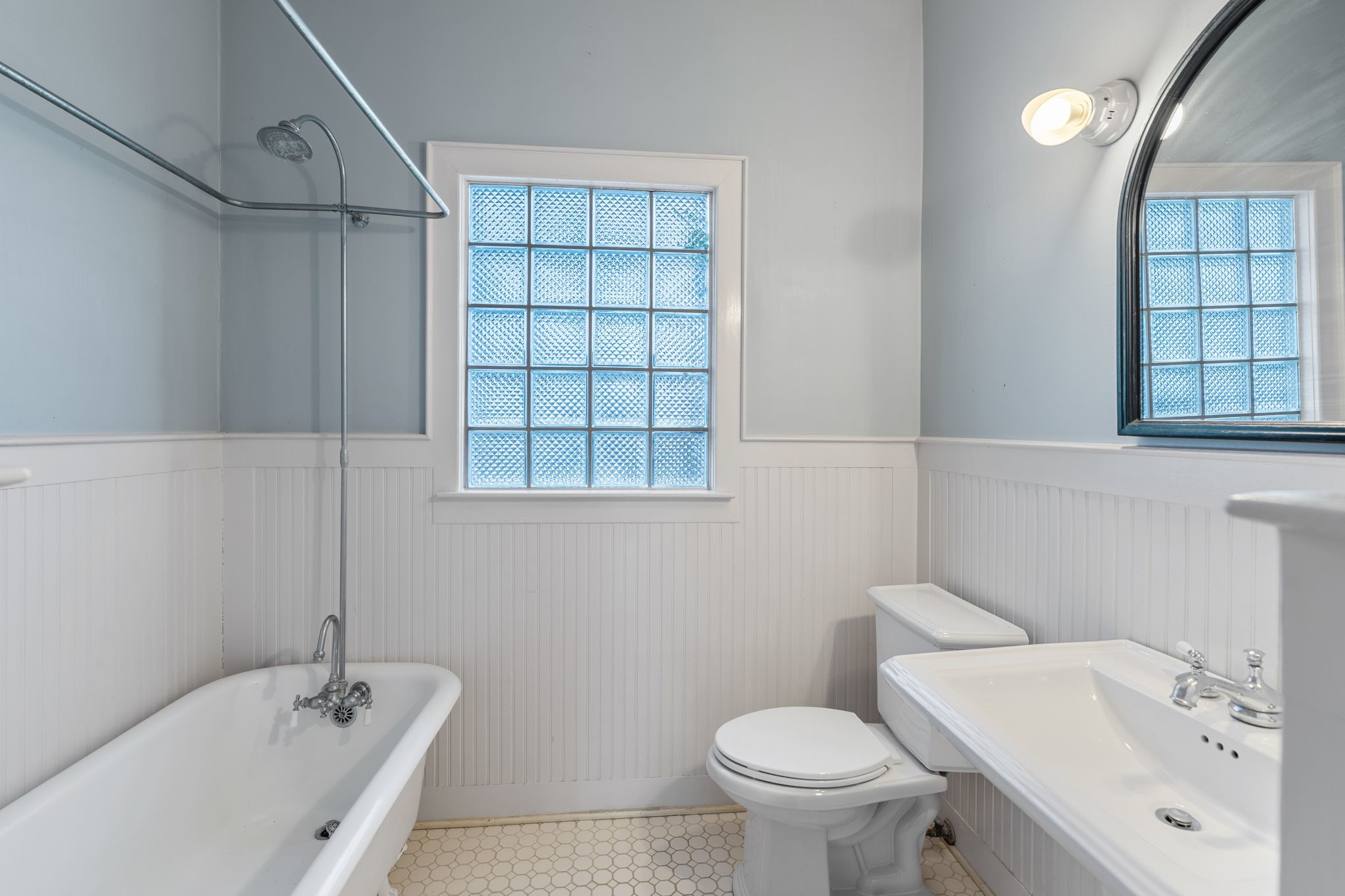217 Teetshorn Street Houston, TX 77009 - Photo 17 of 21 a bathroom with a sink toilet and shower