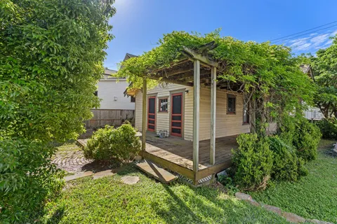 front view of a house with a small yard