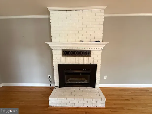 a living room with a fireplace
