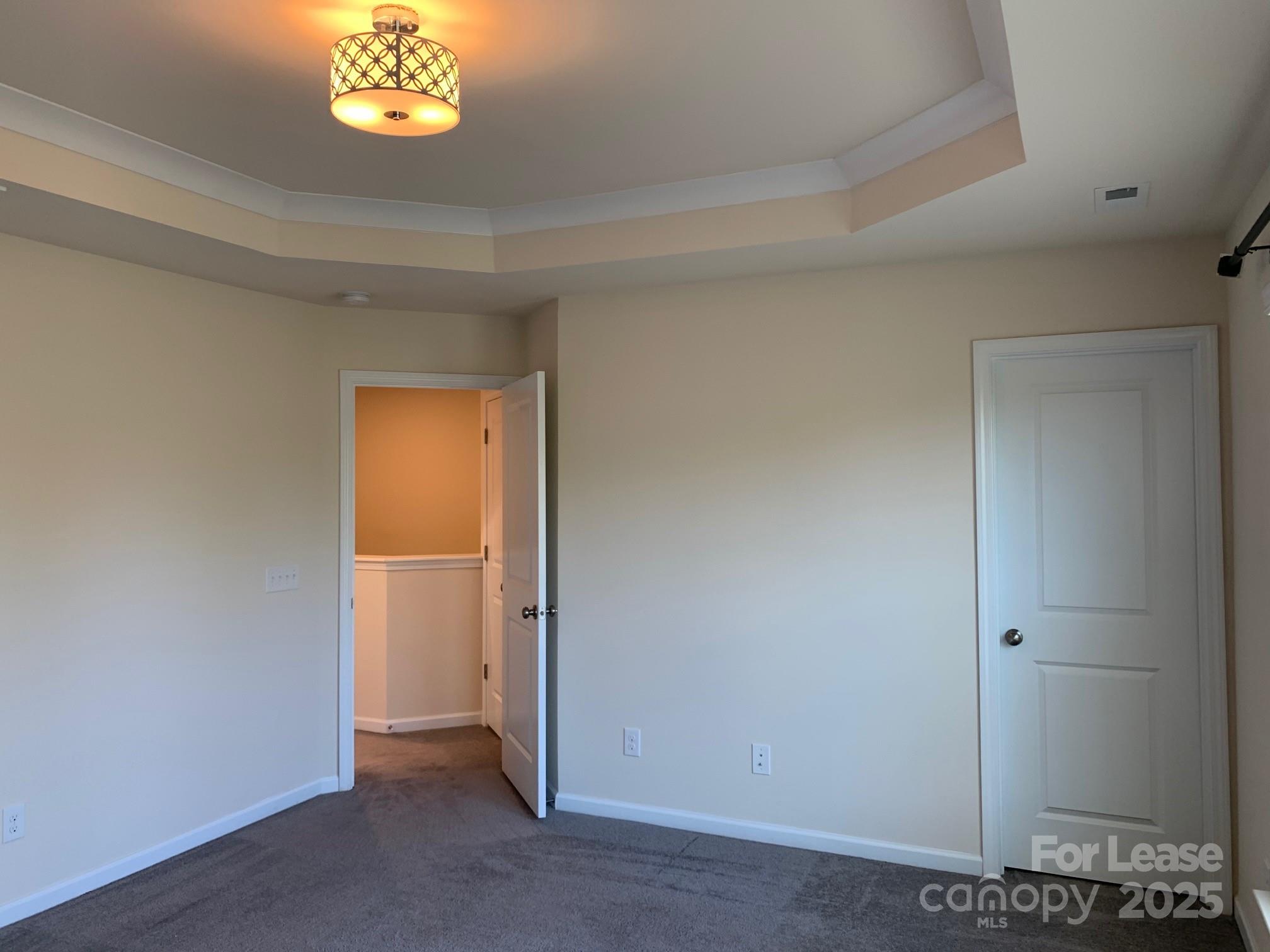 905 Wicawa Road Fort Mill, SC 29708 - Photo 17 of 29 an empty room with a hallway