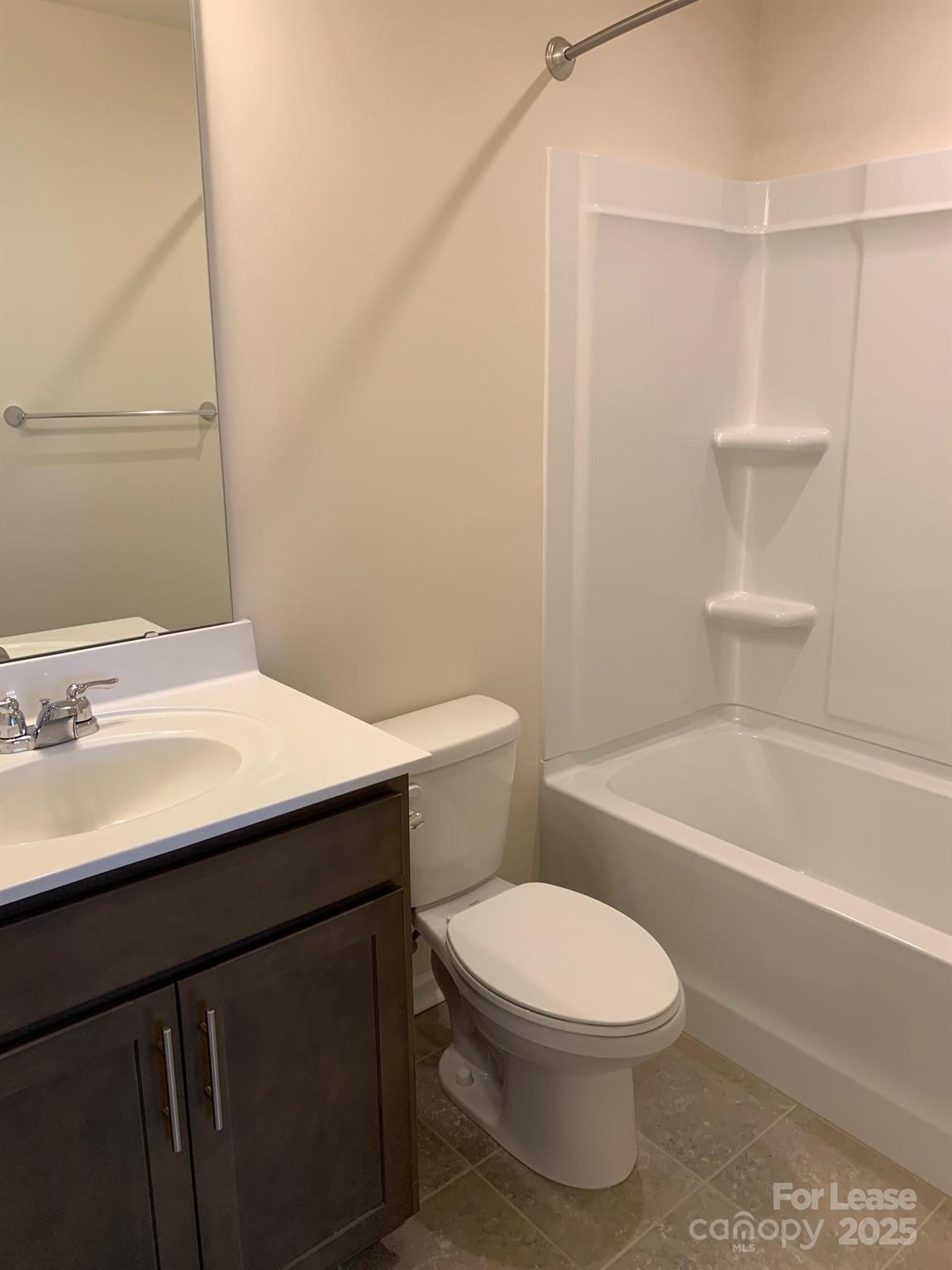 905 Wicawa Road Fort Mill, SC 29708 - Photo 23 of 29 a bathroom with a sink a toilet and shower