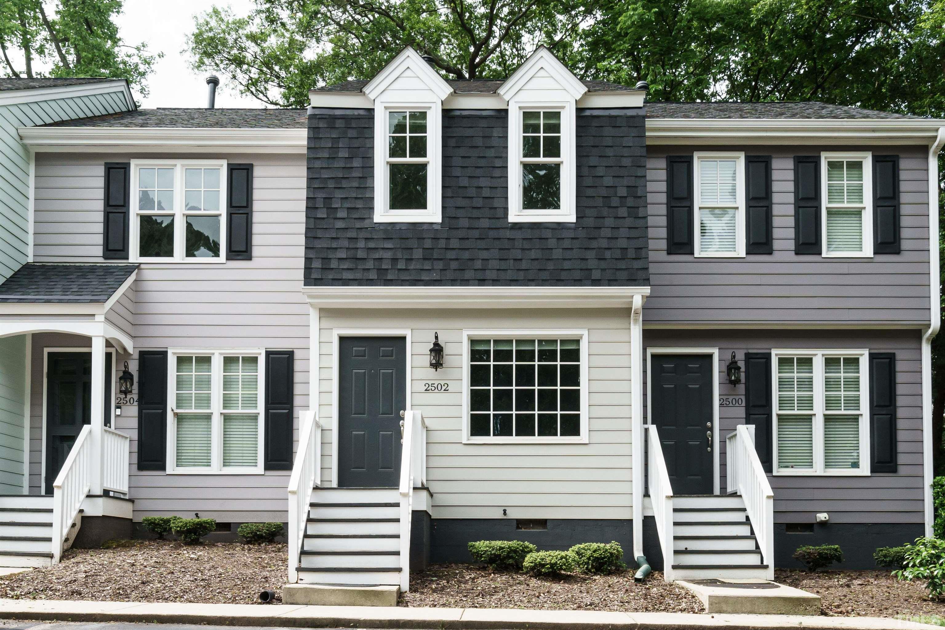 2502 Noble Road Raleigh, NC 27608 - Photo 1 of 19 a front view of a house with a yard
