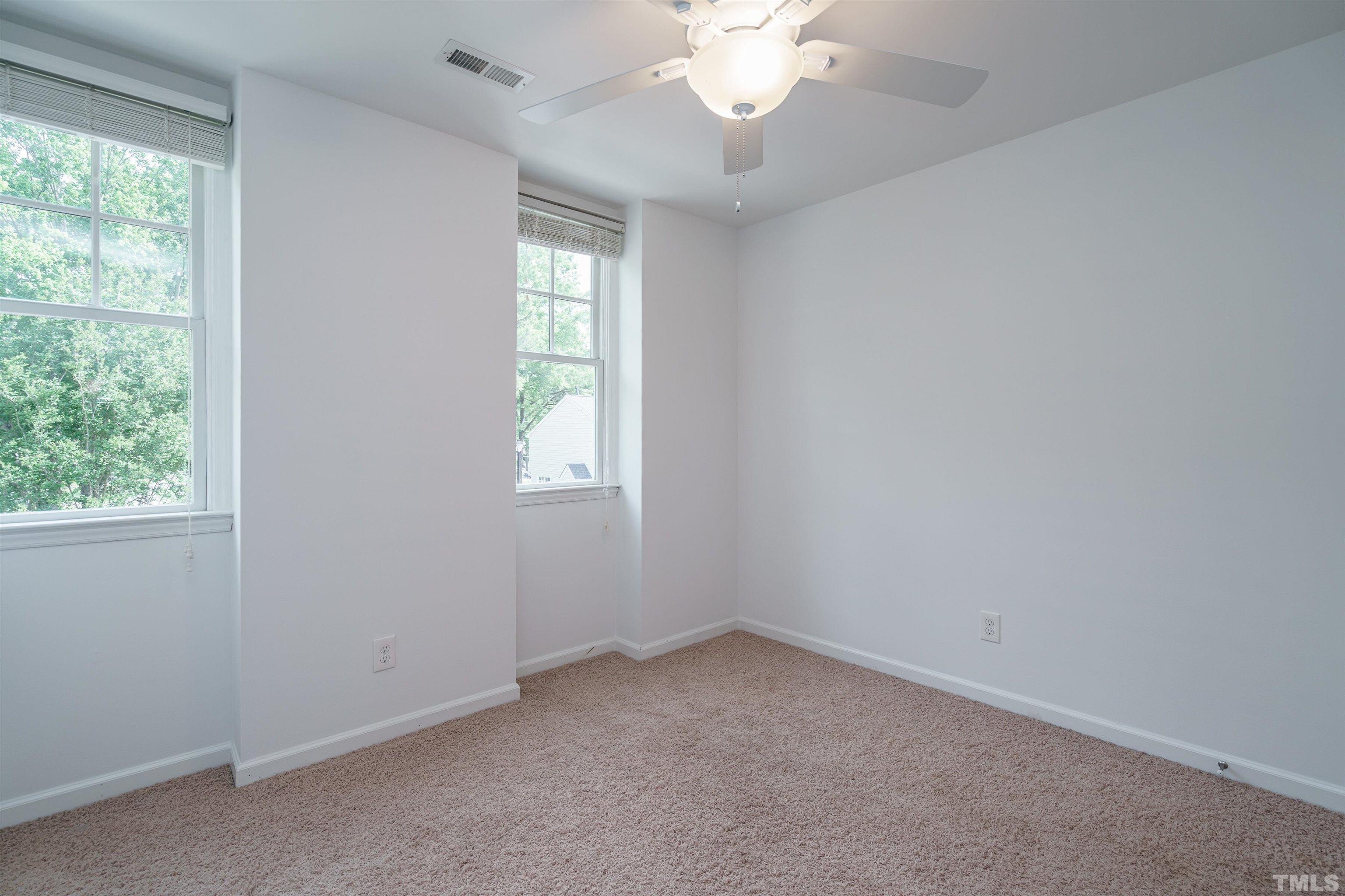 2502 Noble Road Raleigh, NC 27608 - Photo 13 of 19 an empty room with a window