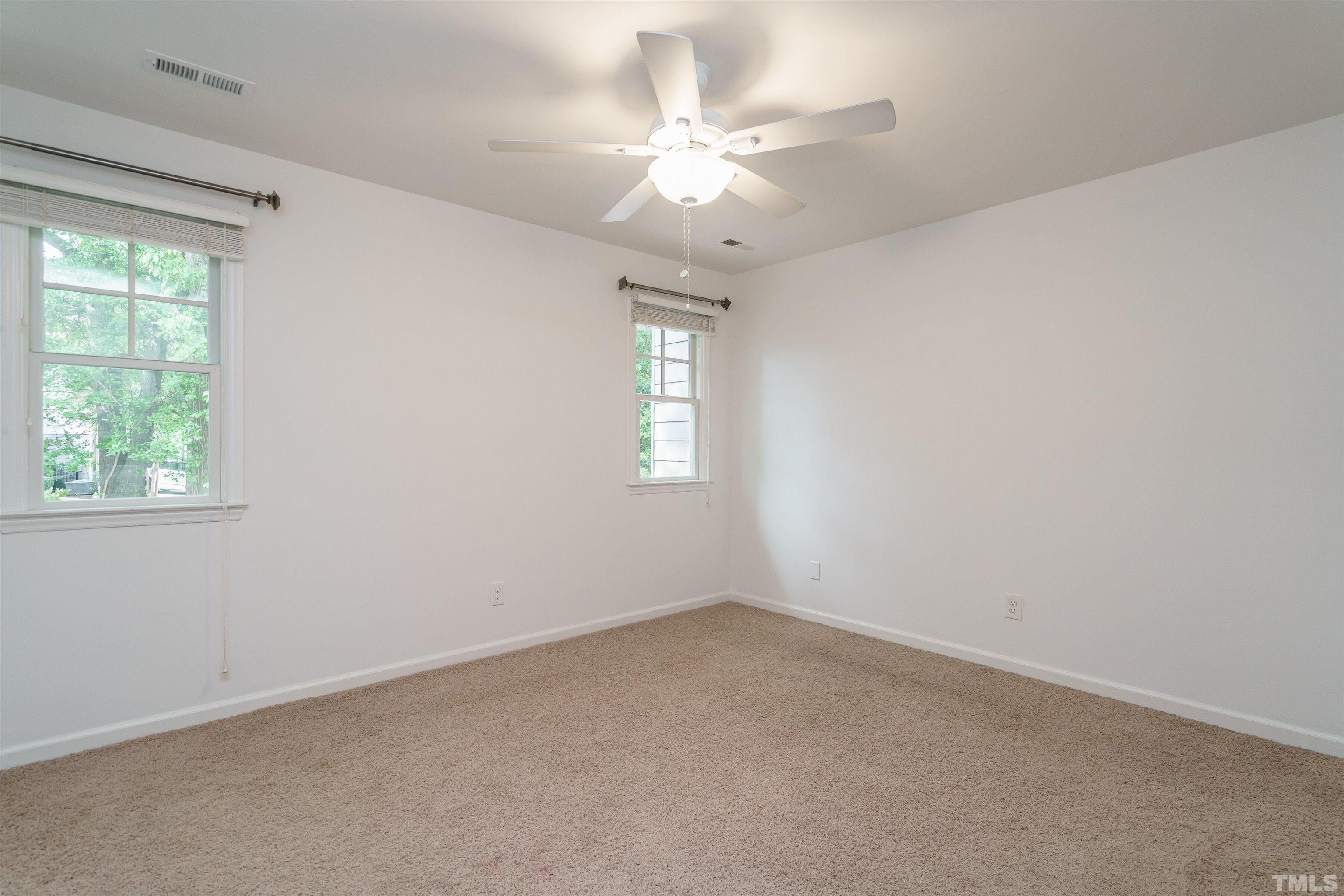 2502 Noble Road Raleigh, NC 27608 - Photo 15 of 19 a view of an empty room with a window