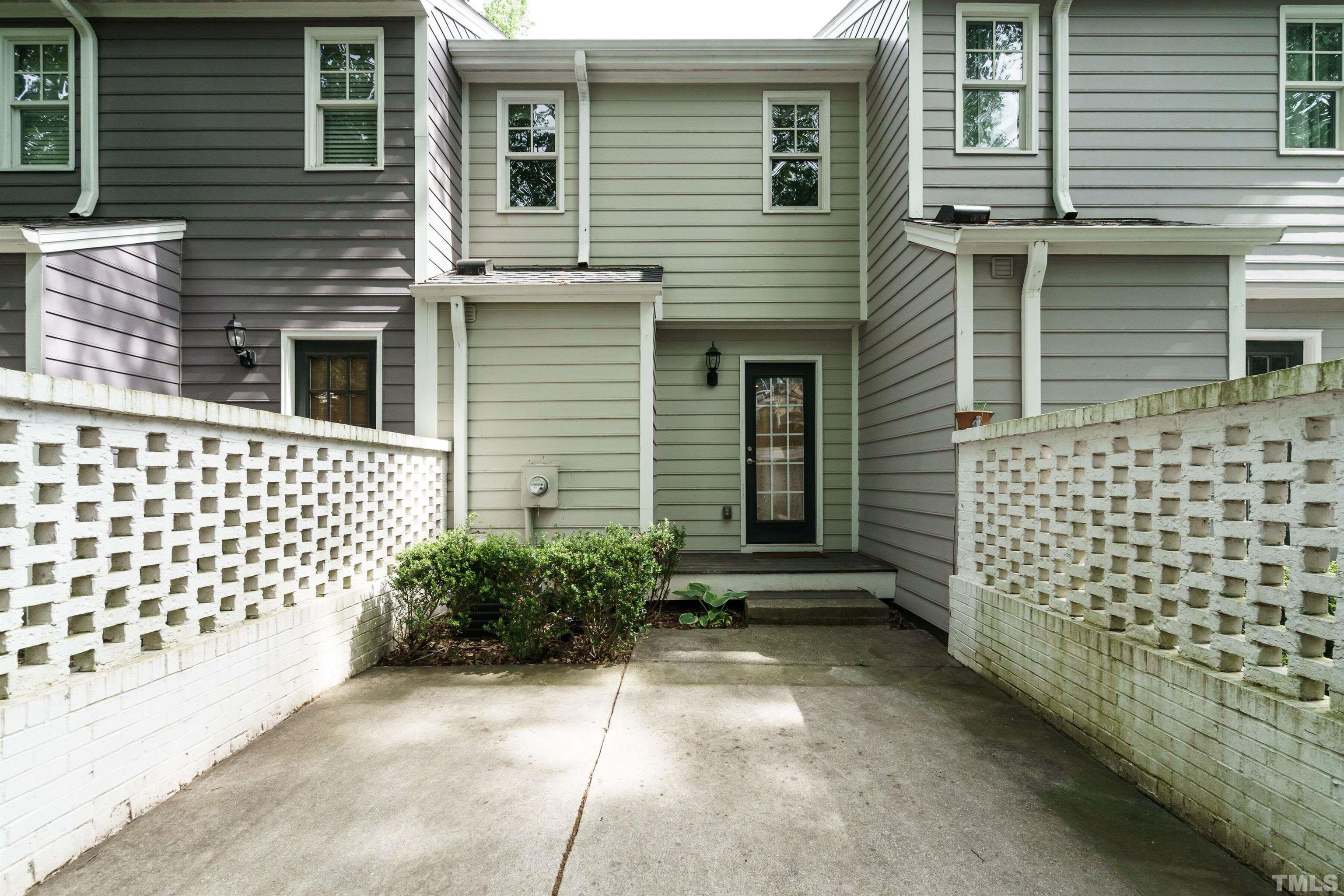 2502 Noble Road Raleigh, NC 27608 - Photo 18 of 19 a view of a house with a yard