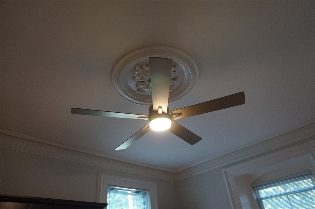 73 Elm Road, Unit 4 Newton, MA 02460 - Photo 11 of 12 a view of a chandelier fan in a room