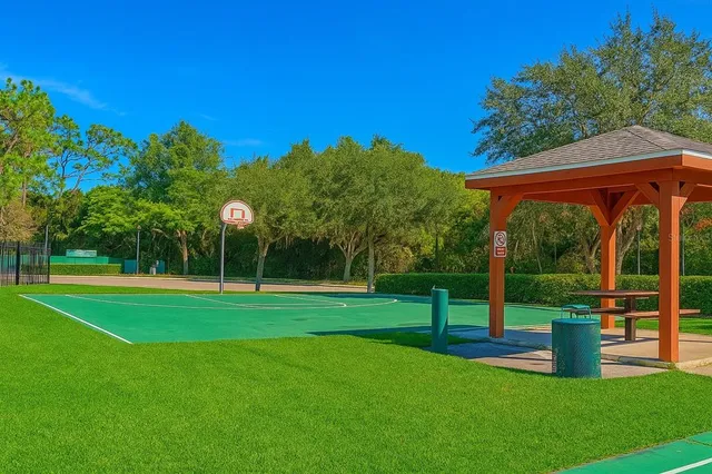 a view of swimming pool with outdoor seating