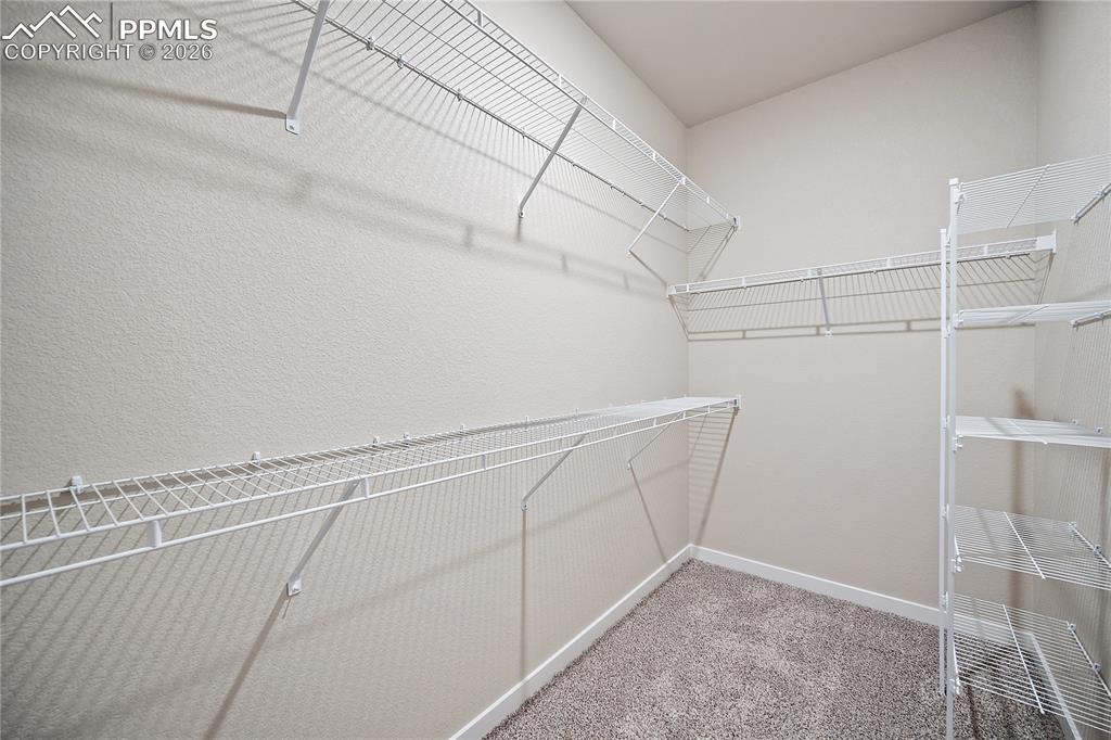 9653 Pinpoint Drive Fountain, CO 80817 - Photo 21 of 34 a view of a room with racks on the wall