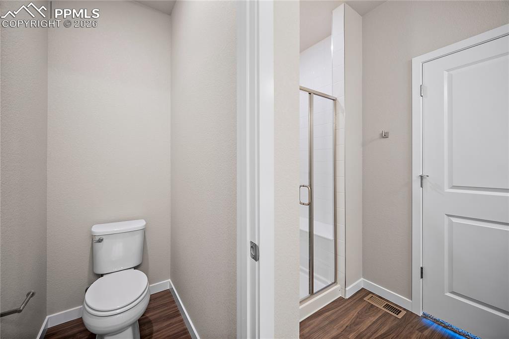 9653 Pinpoint Drive Fountain, CO 80817 - Photo 22 of 34 a bathroom with a toilet