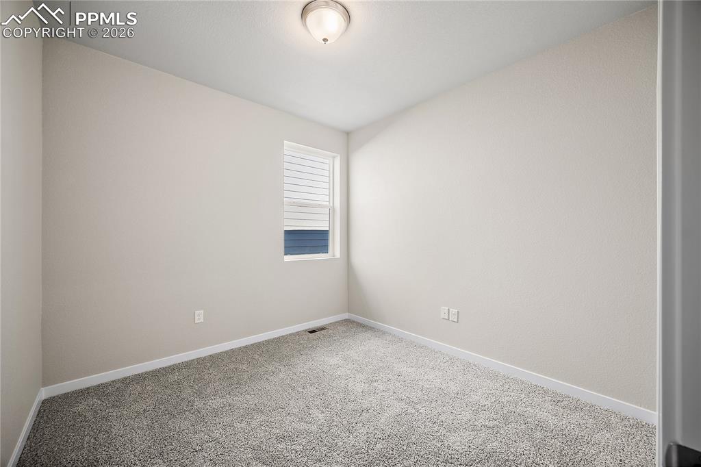 9653 Pinpoint Drive Fountain, CO 80817 - Photo 25 of 34 a view of an empty room and window