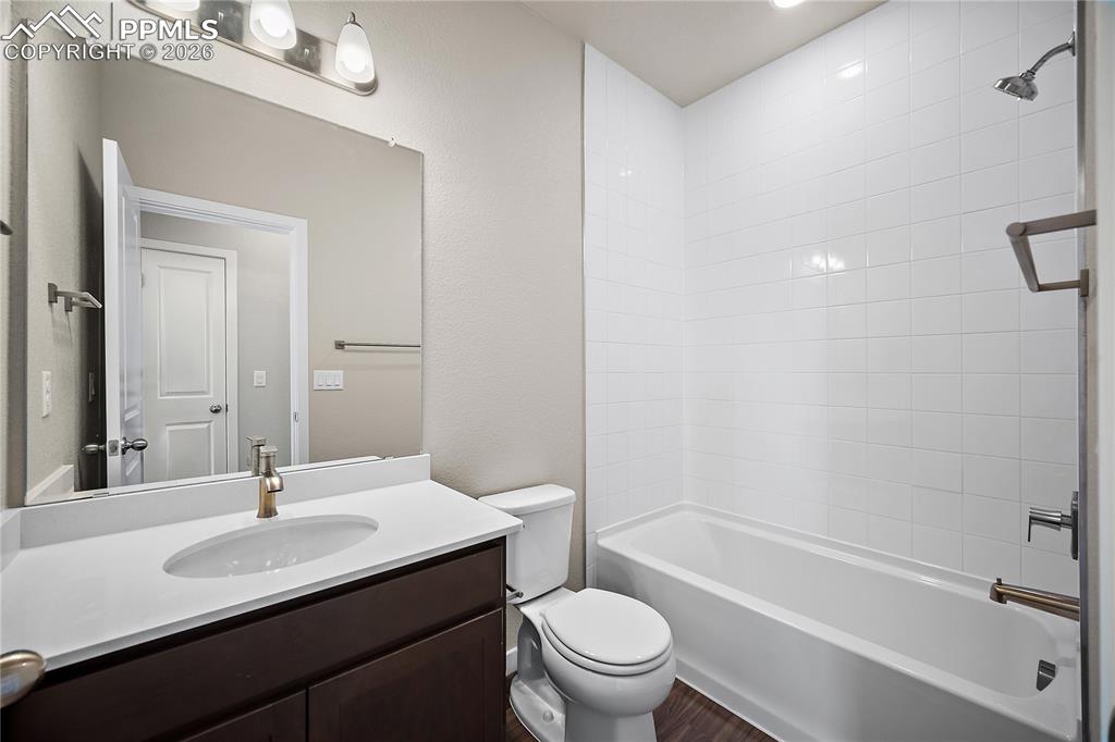 9653 Pinpoint Drive Fountain, CO 80817 - Photo 6 of 34 a bathroom with a sink a toilet and shower