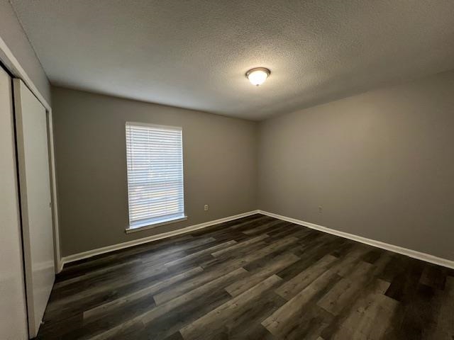 1012 Greencliff Road Collierville, TN 38017 - Photo 15 of 21 an empty room with wooden floor and windows