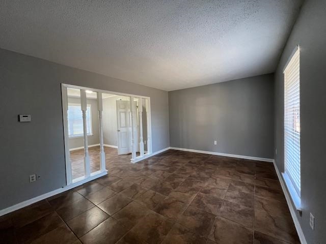 1012 Greencliff Road Collierville, TN 38017 - Photo 3 of 21 an empty room with sliding door and wooden floor