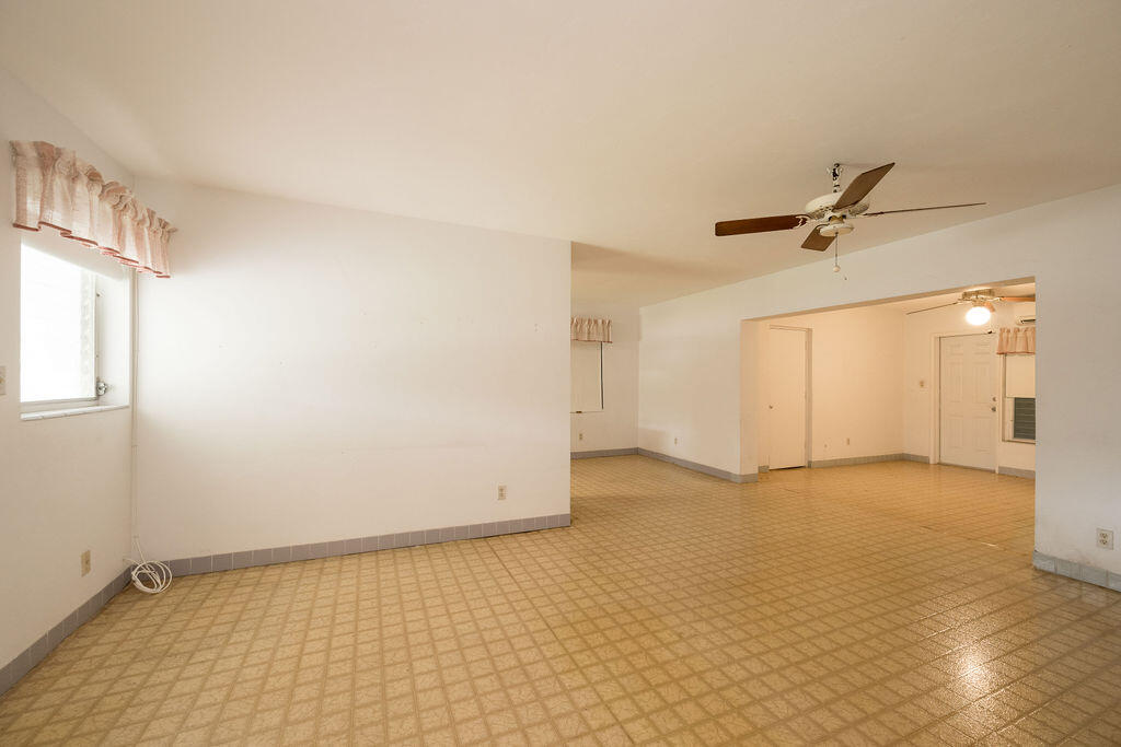 719 Washington Street Key West, FL 33040 - Photo 12 of 28 wooden floor in an empty room