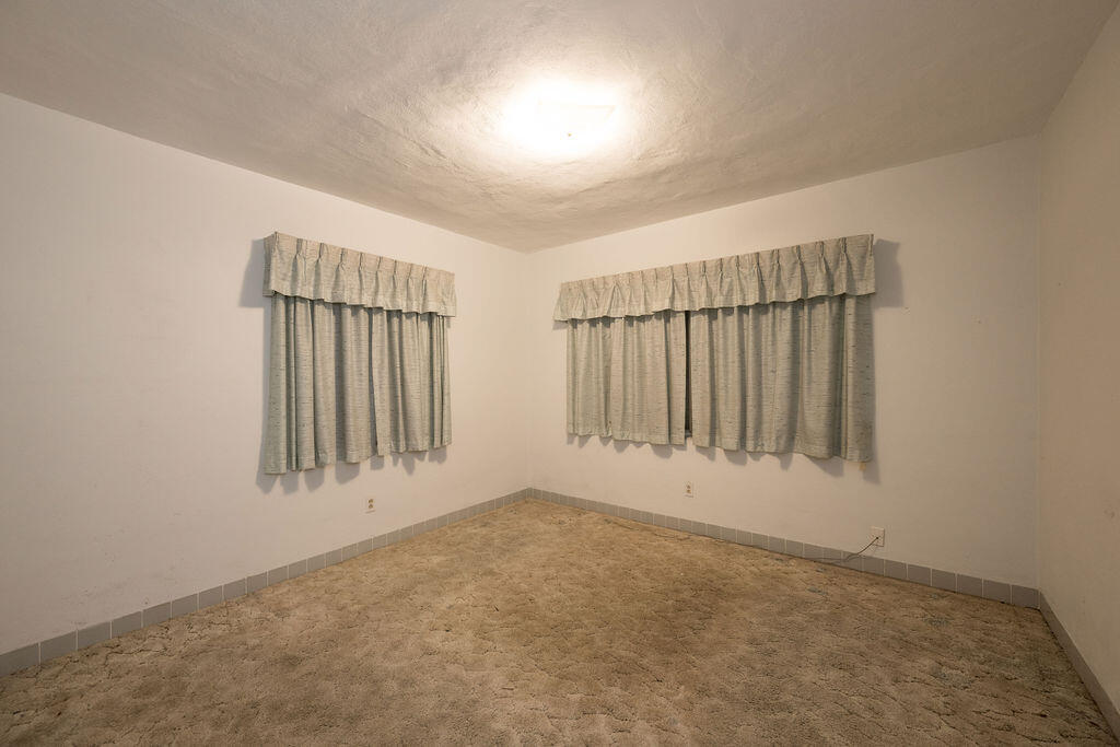 719 Washington Street Key West, FL 33040 - Photo 14 of 28 an empty room with windows