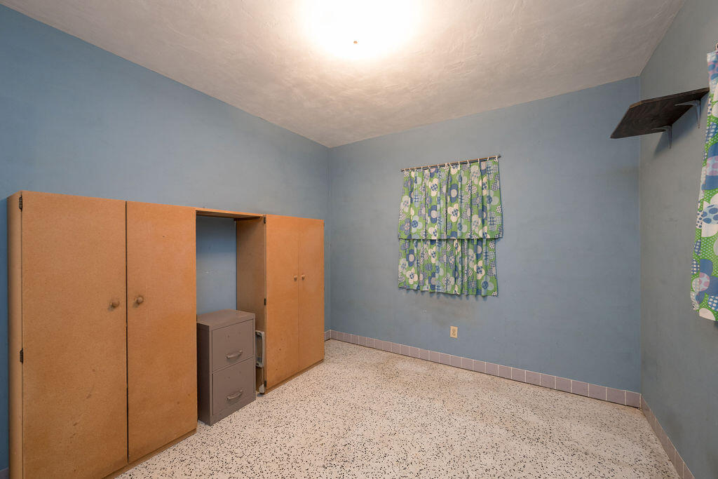 719 Washington Street Key West, FL 33040 - Photo 17 of 28 an empty room with windows