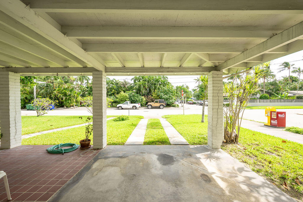 719 Washington Street Key West, FL 33040 - Photo 28 of 28 a view of a room with wooden floor and a swimming pool