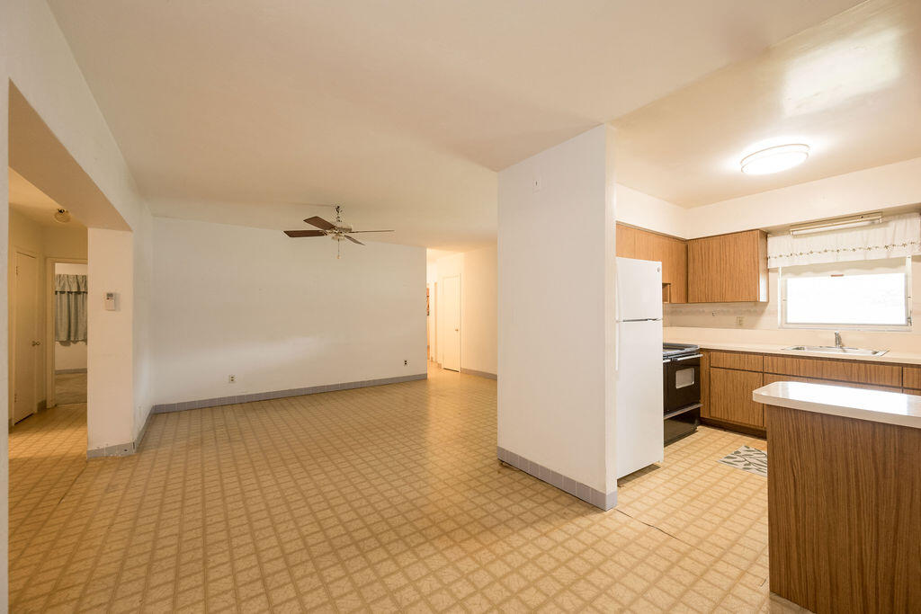 719 Washington Street Key West, FL 33040 - Photo 7 of 28 a view of a kitchen with a sink