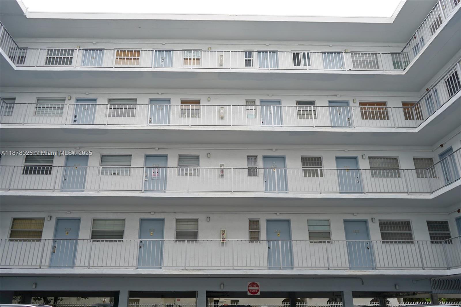 221 Meridian Avenue, Unit 211 Miami Beach, FL 33139 - Photo 13 of 20 a large building with a lot of windows