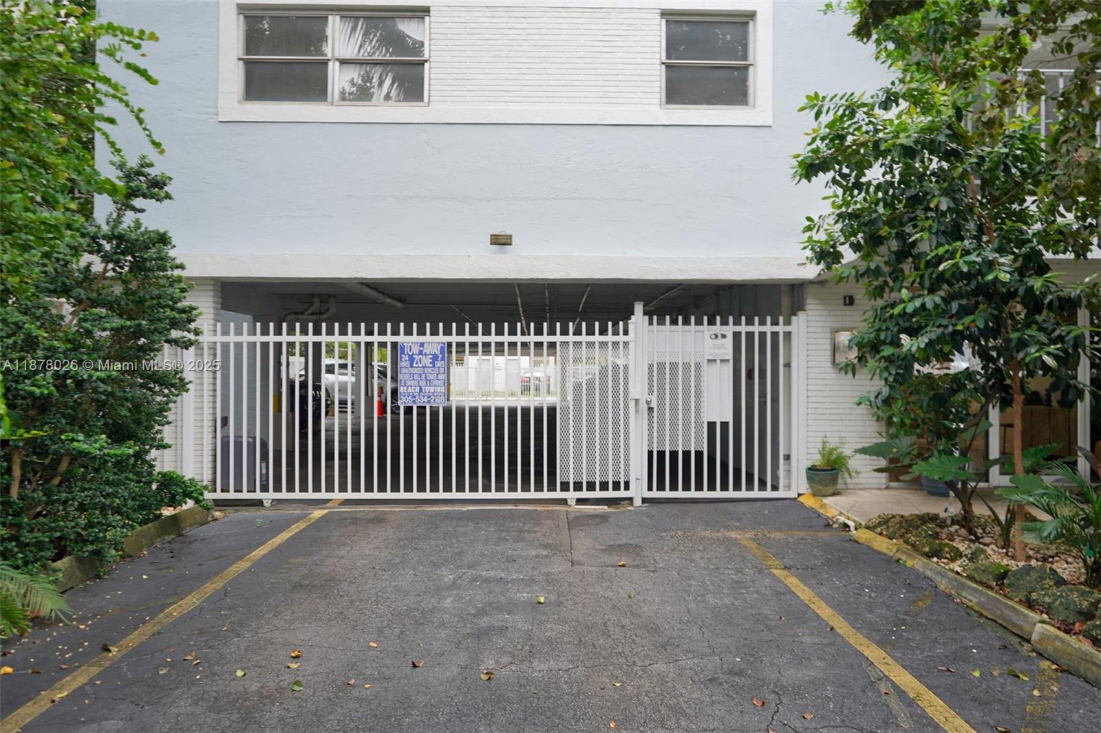 221 Meridian Avenue, Unit 211 Miami Beach, FL 33139 - Photo 18 of 20 a front view of a house with a garden