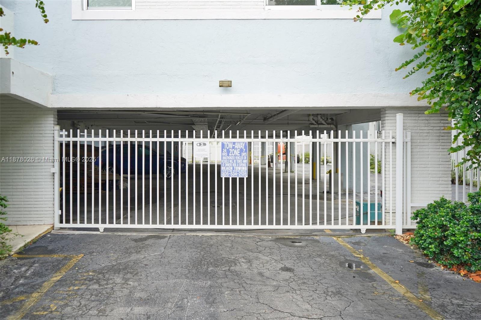 221 Meridian Avenue, Unit 211 Miami Beach, FL 33139 - Photo 19 of 20 a black car parked in front of a house