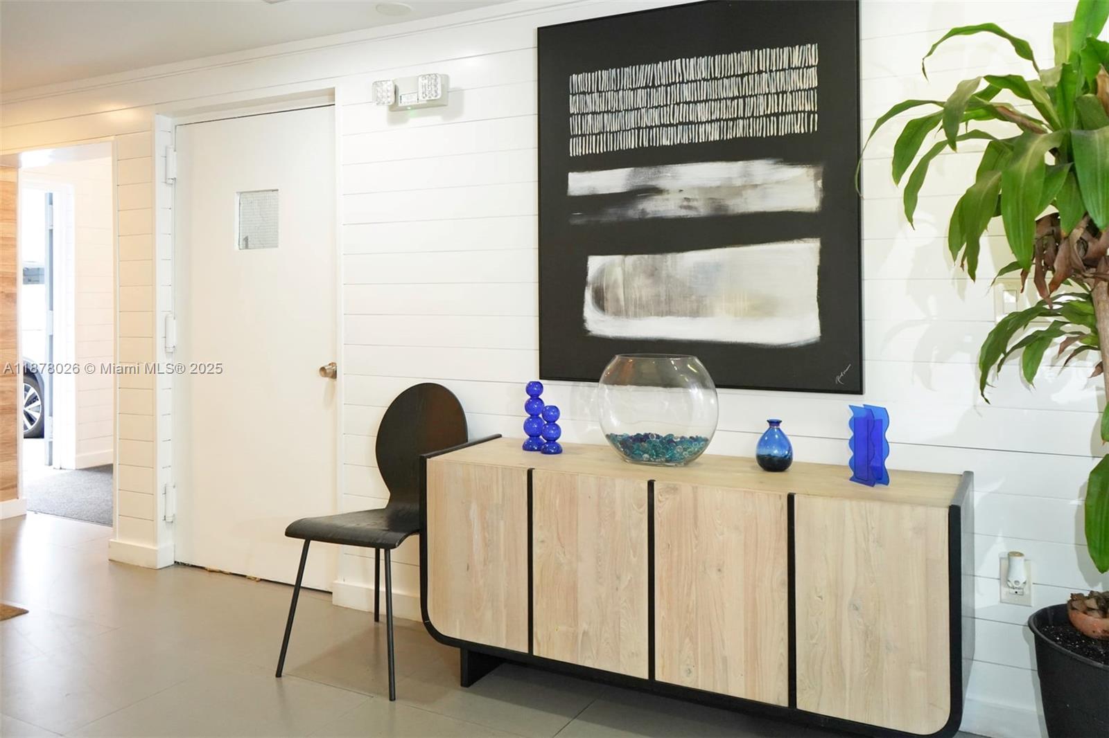 221 Meridian Avenue, Unit 211 Miami Beach, FL 33139 - Photo 10 of 20 a bathroom with a bathtub and a sink
