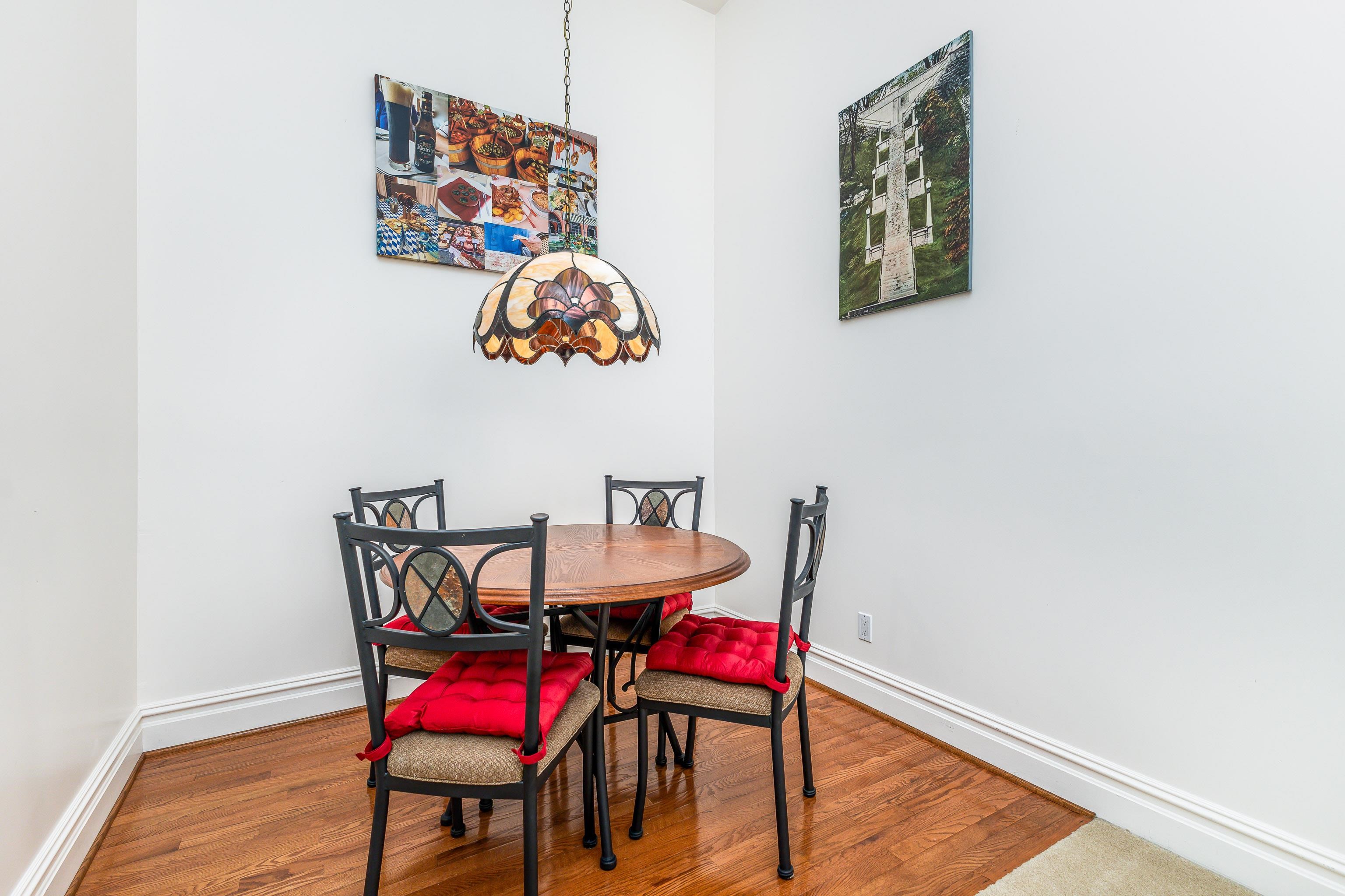 411 South Prospect Street, Unit 204 Galena, IL 61036 - Photo 11 of 18 a dining room with furniture and wooden floor