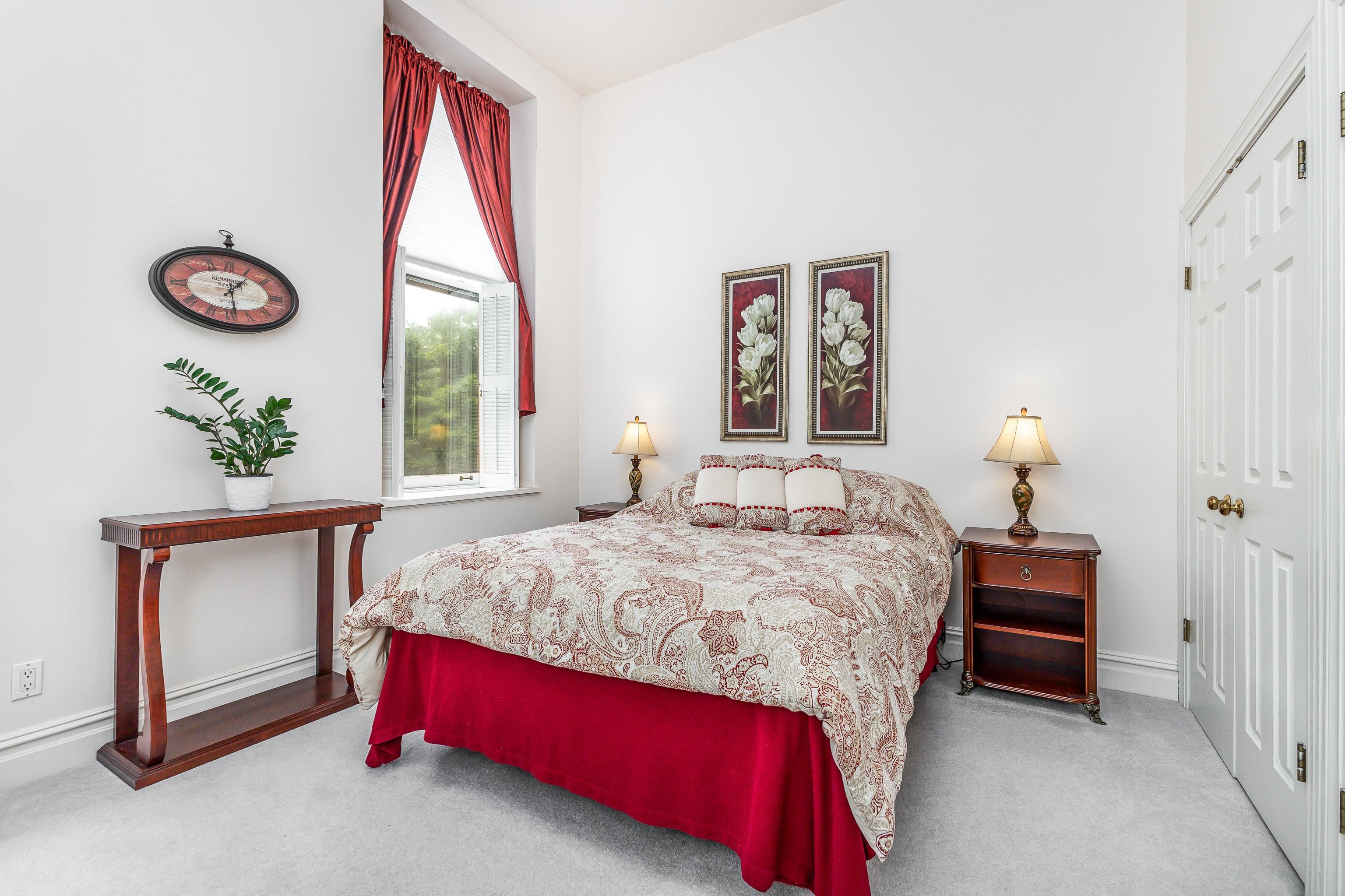 411 South Prospect Street, Unit 204 Galena, IL 61036 - Photo 12 of 18 a bedroom with a bed and a window