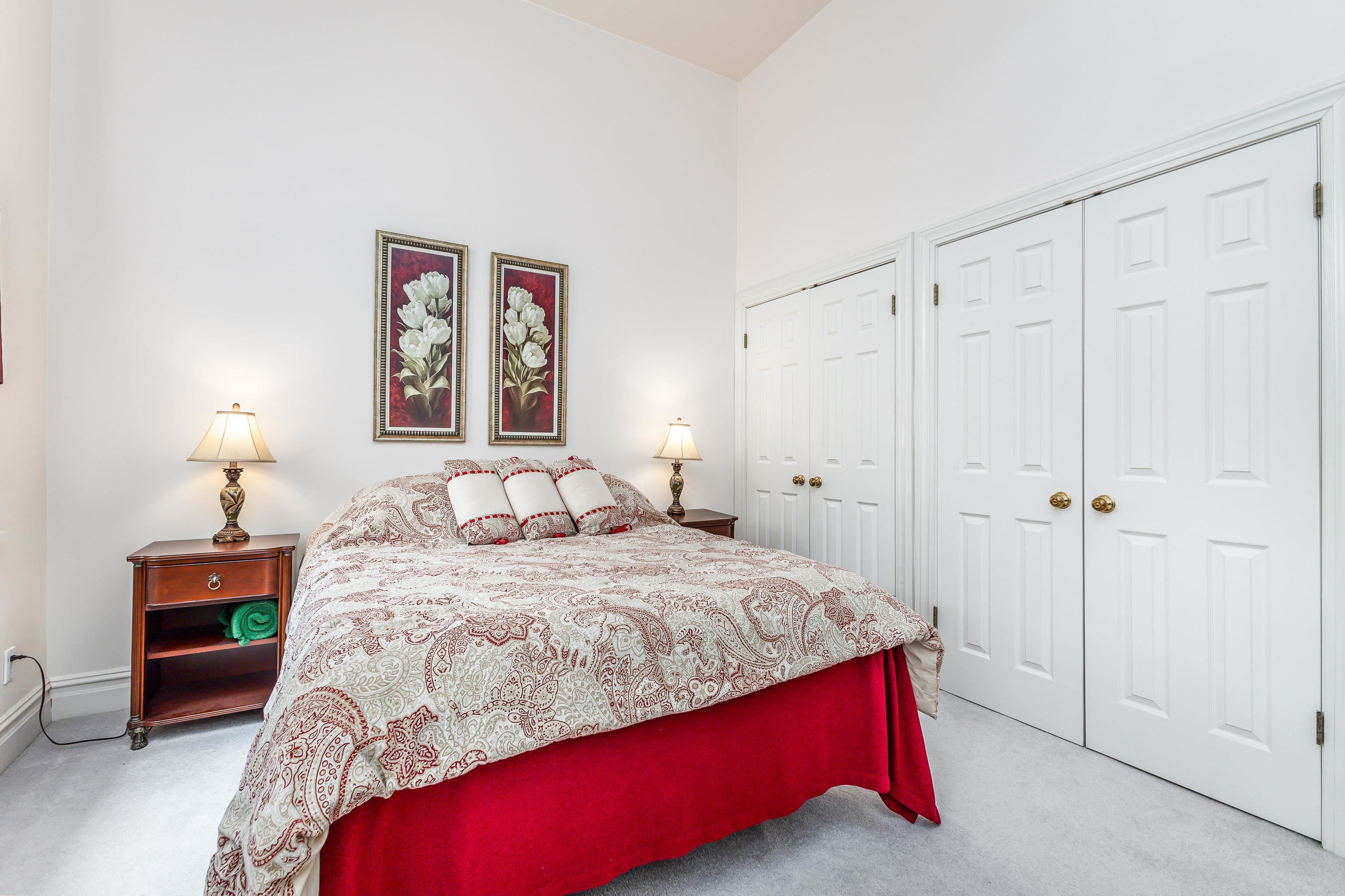 411 South Prospect Street, Unit 204 Galena, IL 61036 - Photo 13 of 18 a bedroom with a bed and a lamp