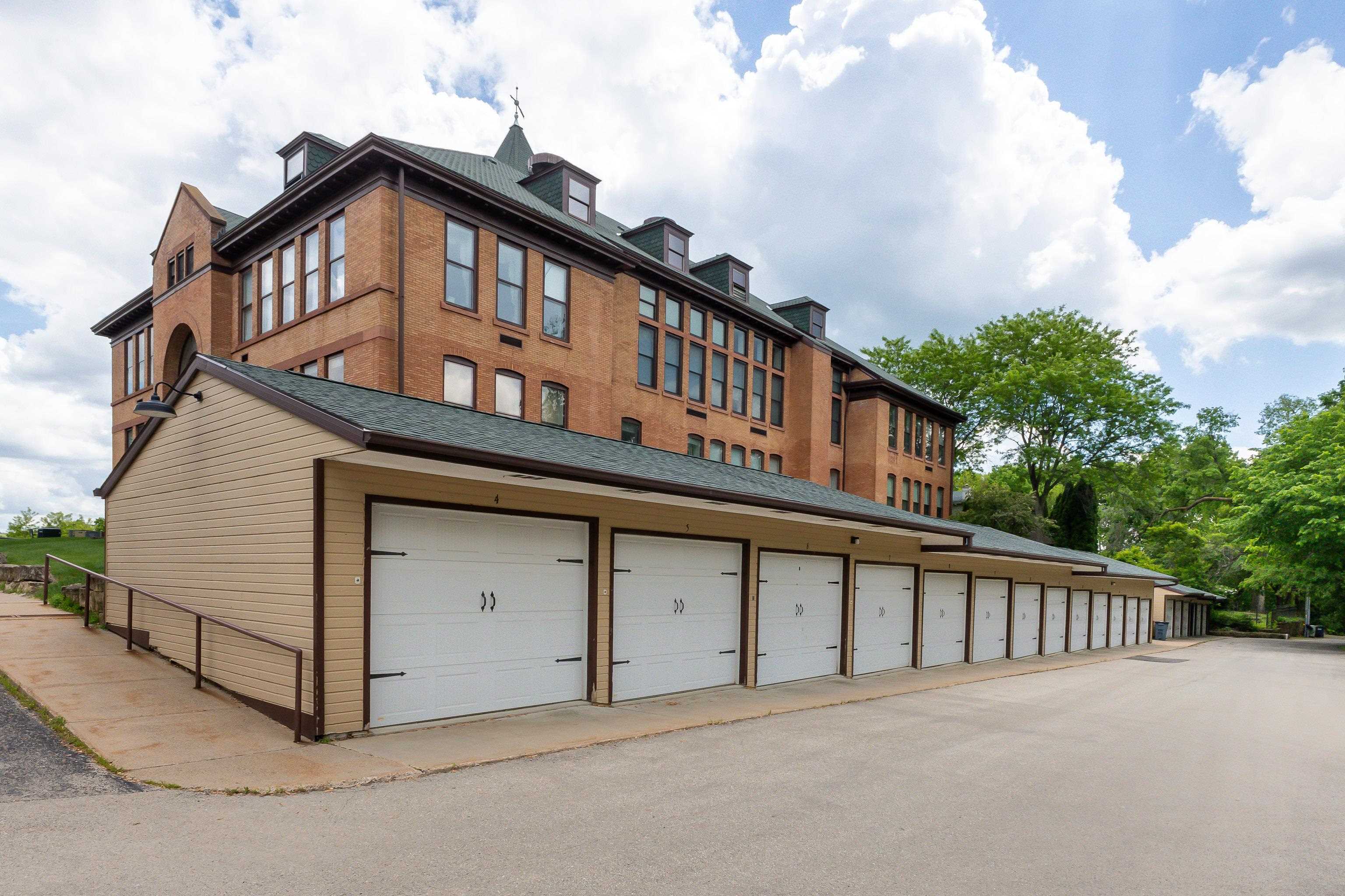 411 South Prospect Street, Unit 204 Galena, IL 61036 - Photo 16 of 18 a view of a house with a balcony