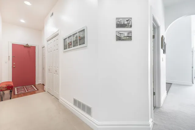 a view of a hallway with workspace