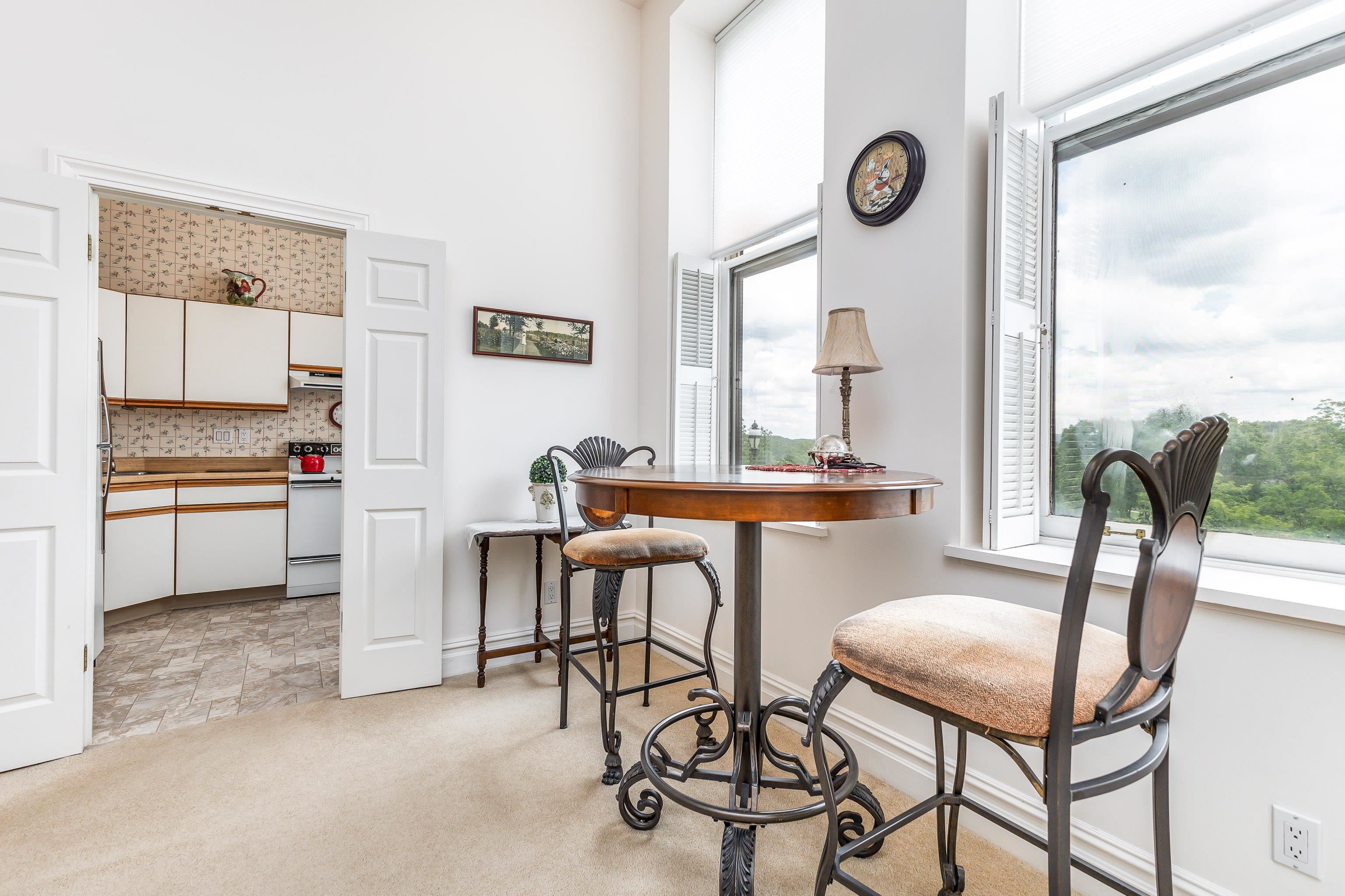 411 South Prospect Street, Unit 204 Galena, IL 61036 - Photo 5 of 18 a view of a dining room with furniture and a window