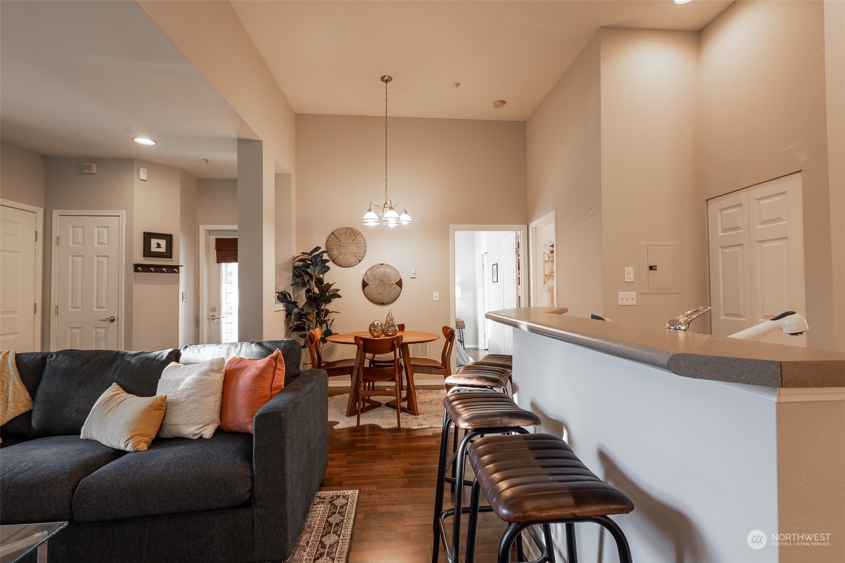 16125 Juanita Woodinville Way Northeast, Unit 2201 Bothell, WA 98011 - Photo 19 of 35 a living room with furniture kitchen view and a large window